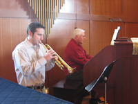 Pastor making music